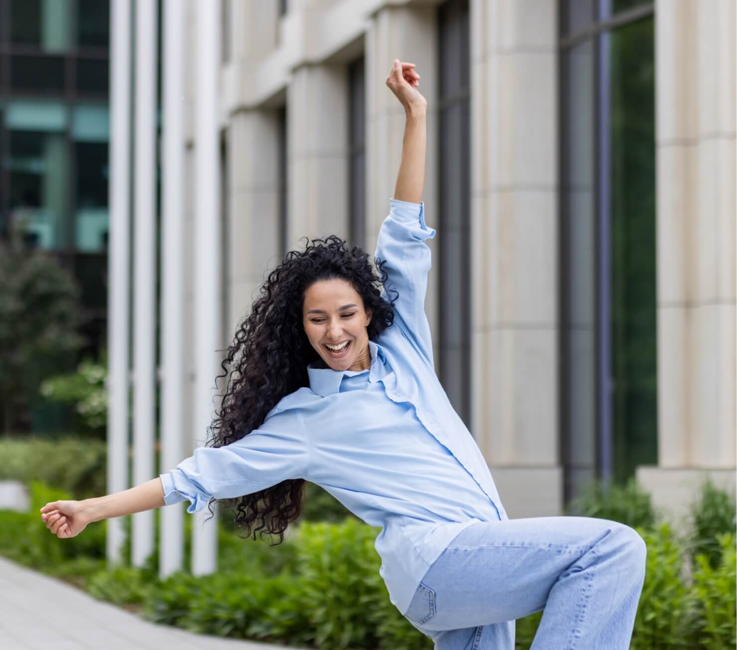joyful-woman-in-casual-clothes-dancing-outdoors-ex-2025-03-25-22-32-48-utc (1)