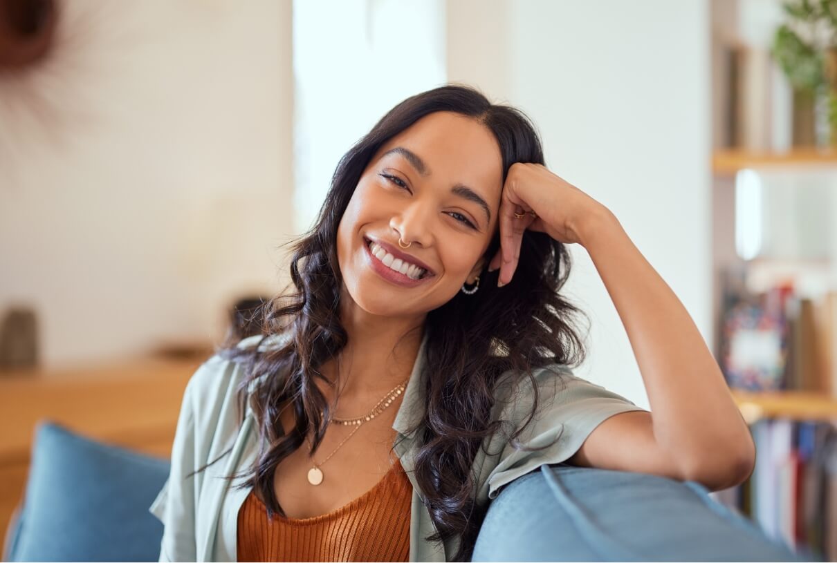 smiling-mixed-race-woman-looking-at-camera-2023-11-27-05-12-21-utc (1)
