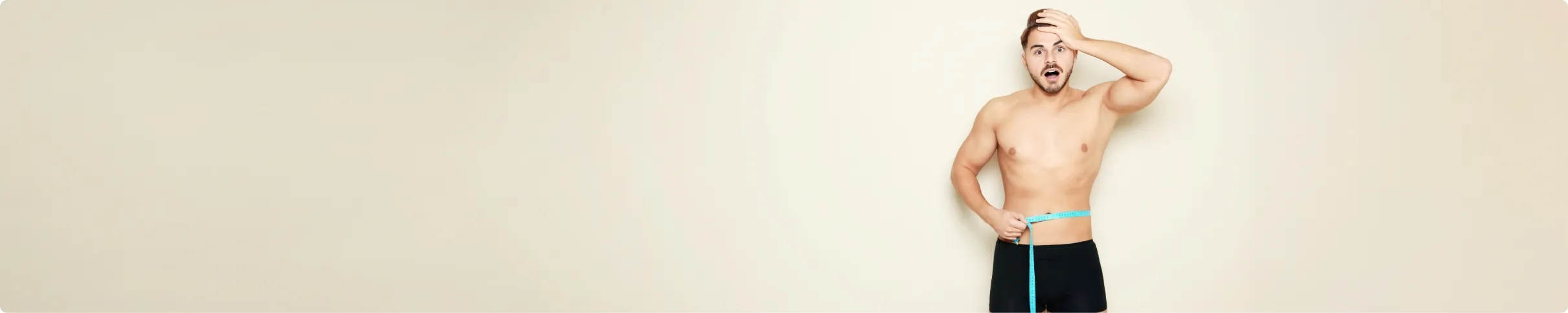 fit man measuring his waist on color background s utc